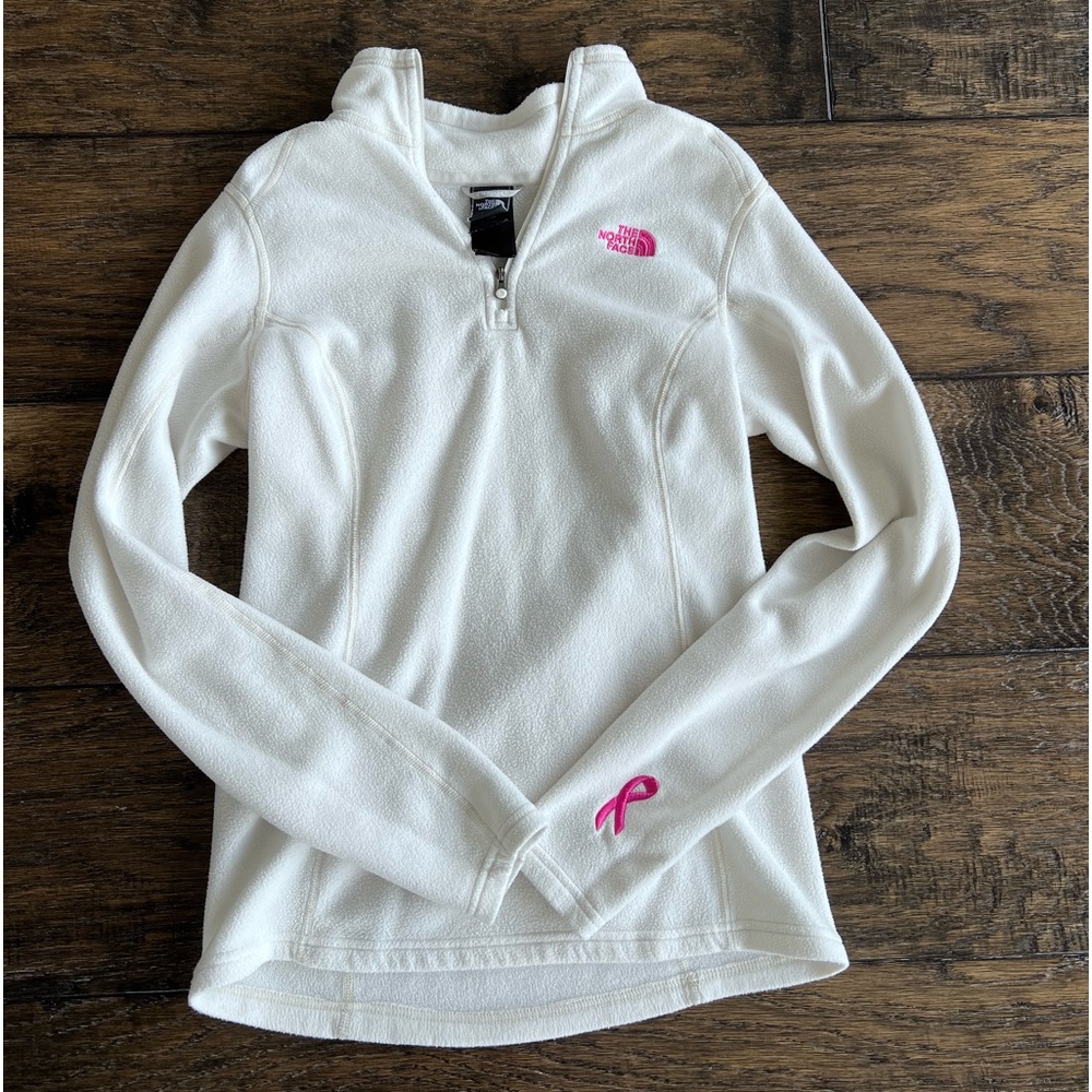 The North Face Women’s Small Quarter Zip with pink lettering
